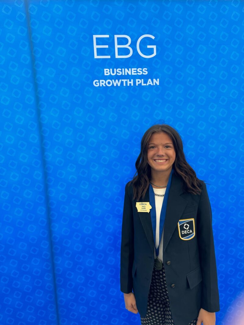 Student with DECA jacket