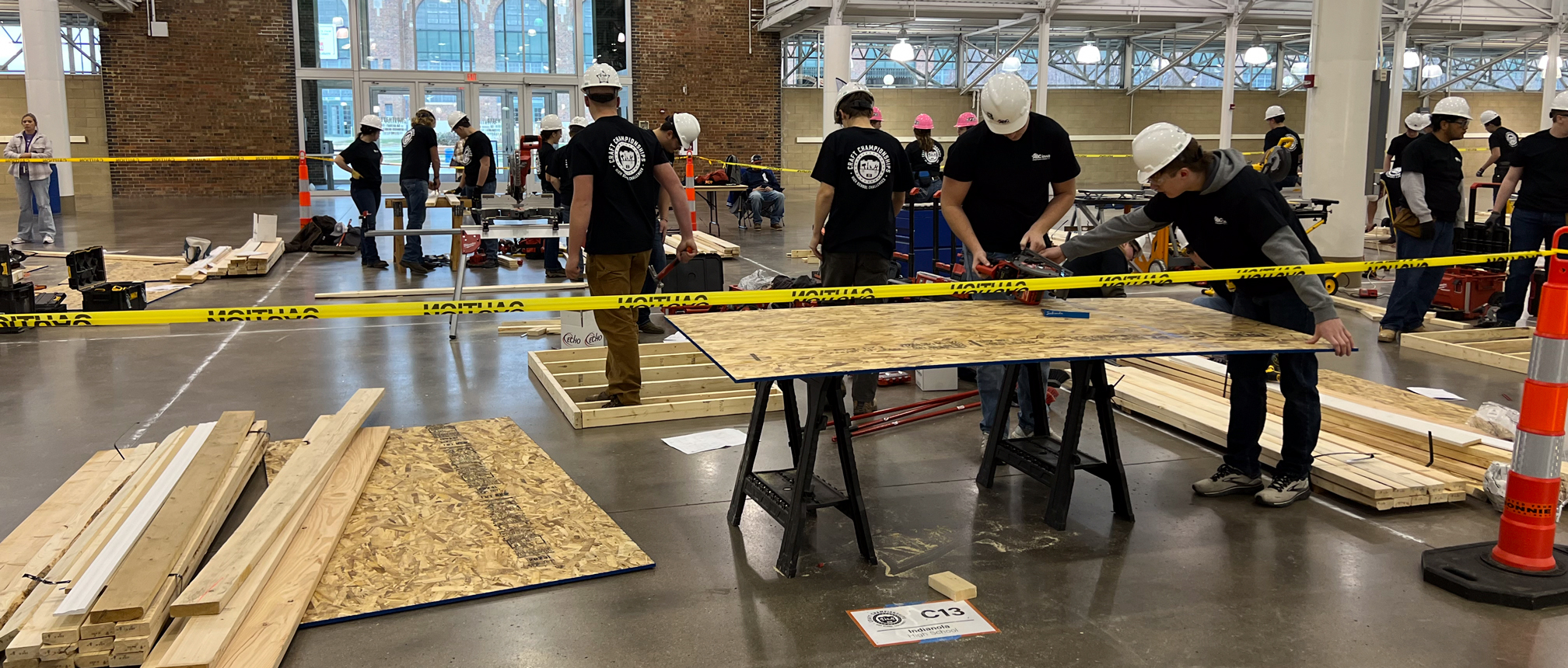woodworking Groups of people with hard hats building with wood